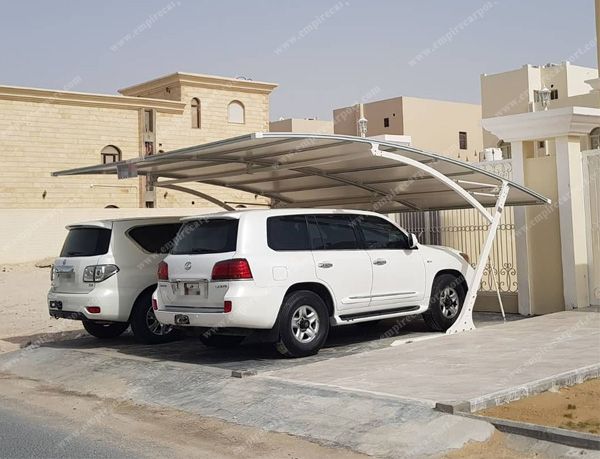 White double carport installed in Qatar